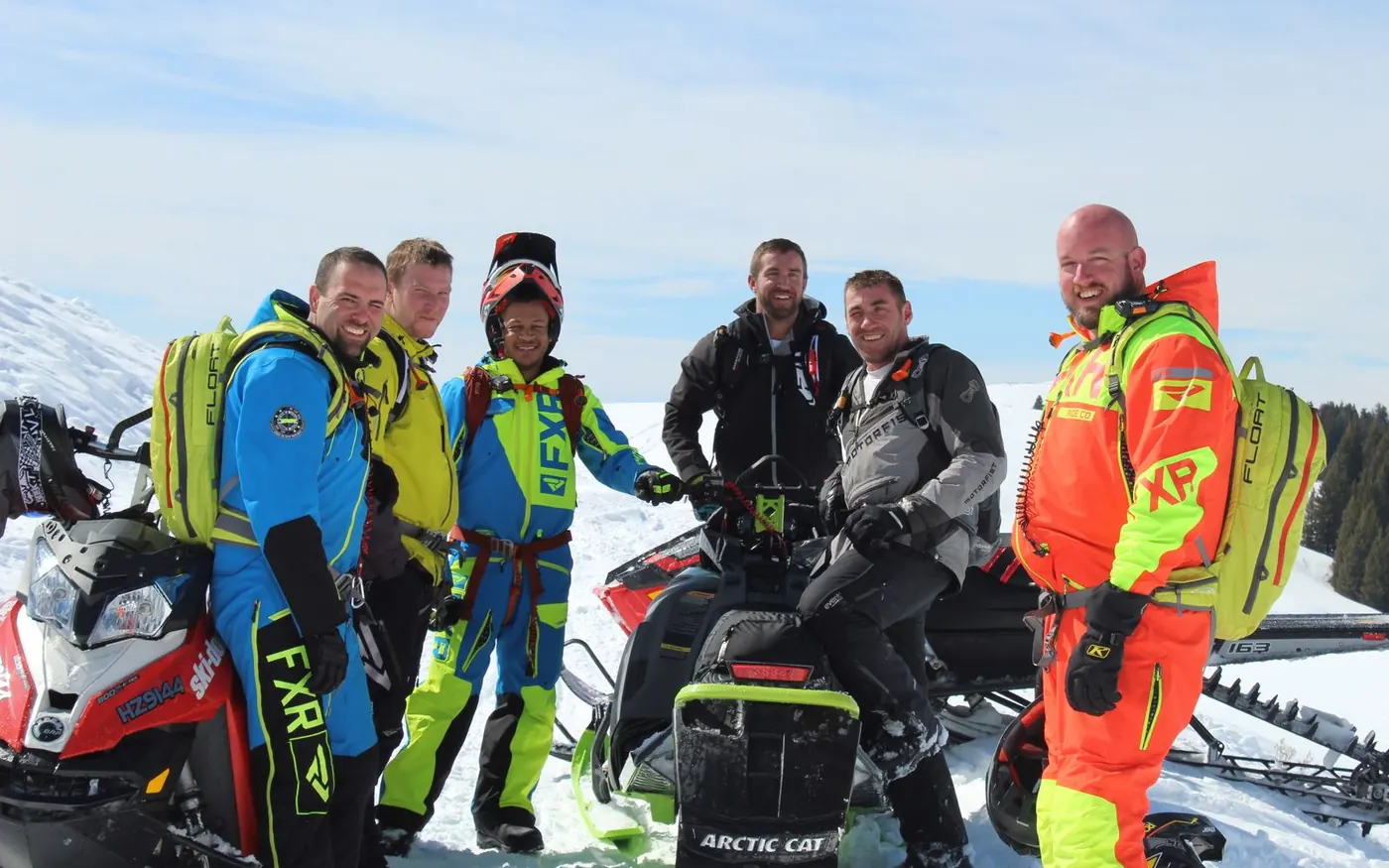 Guided group geared up with avalanche airbag packs